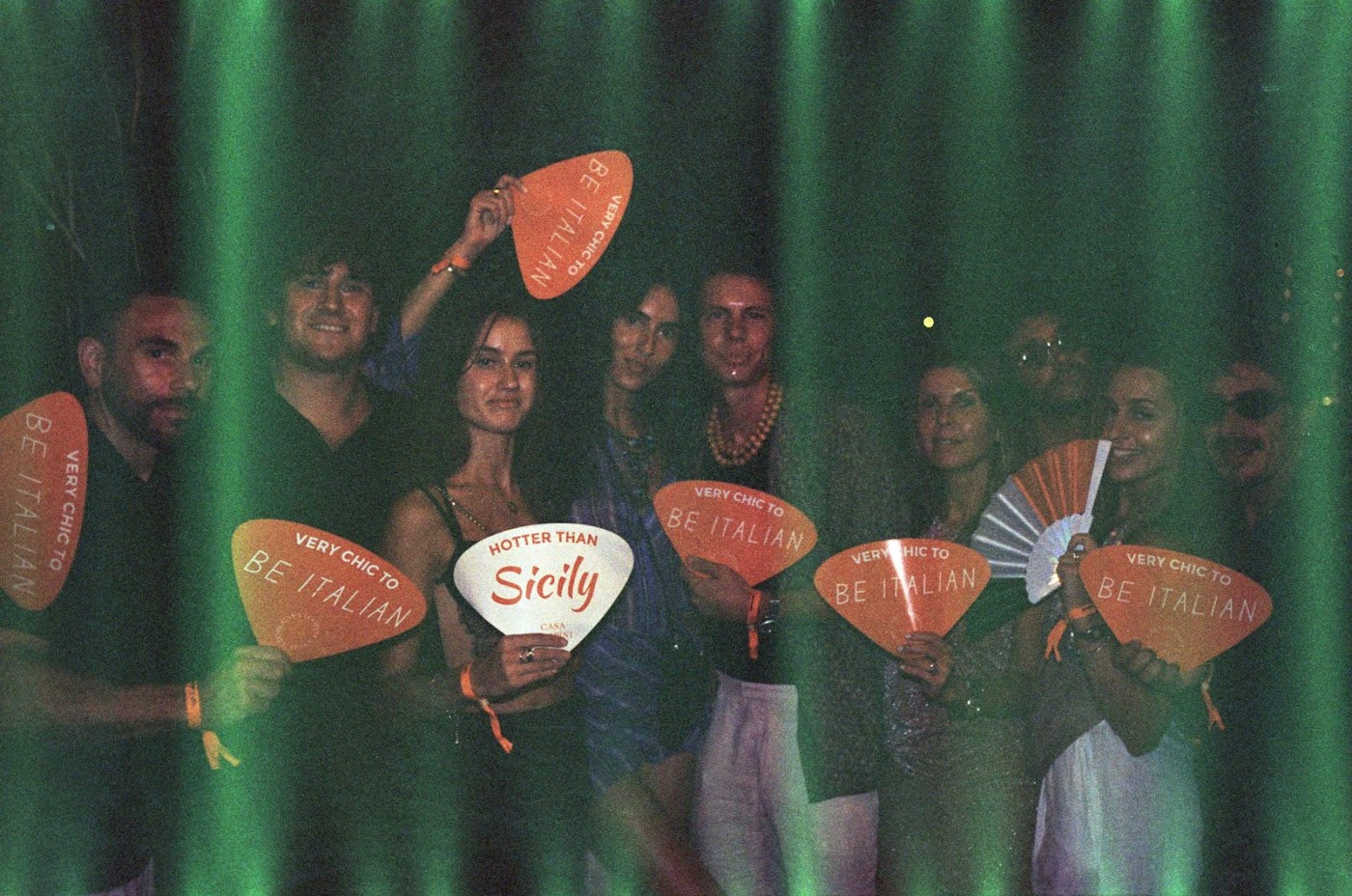 The group holding Very Chic to Be Italian fans